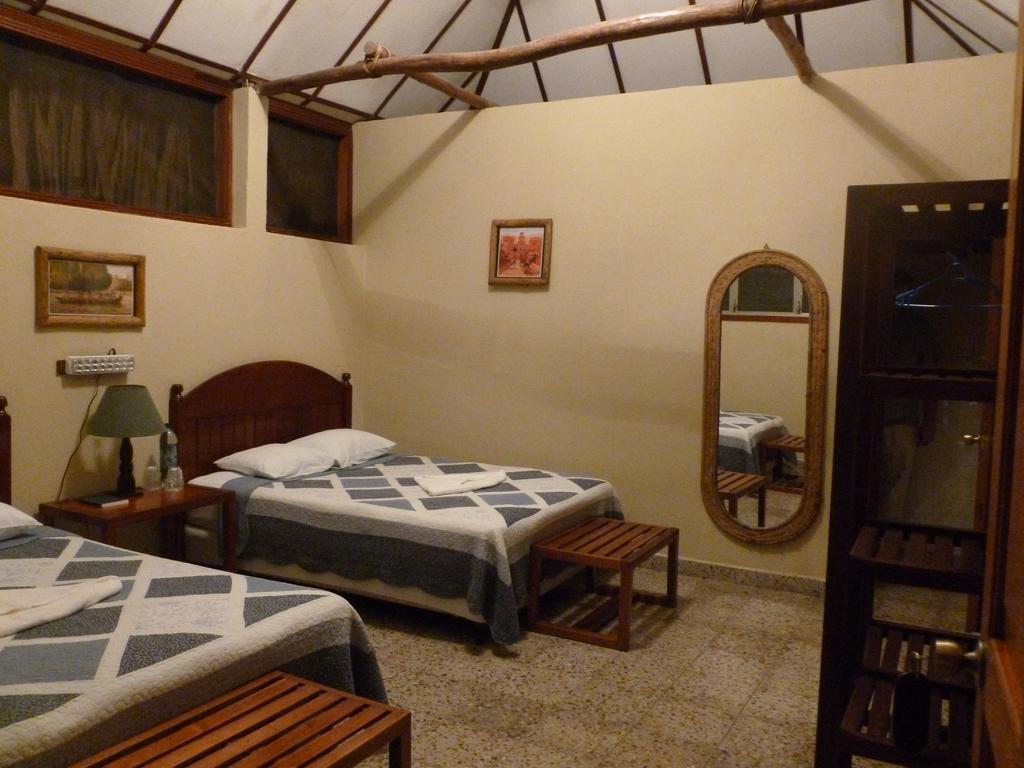 Hotel Jaguar Inn Tikal Quarto foto